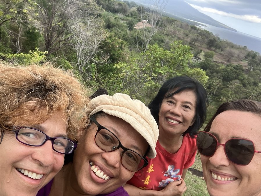 Four ladies on the hill behind virgin beach in Bali